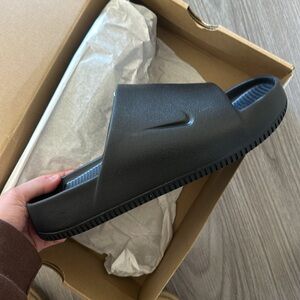 Black Nike slides